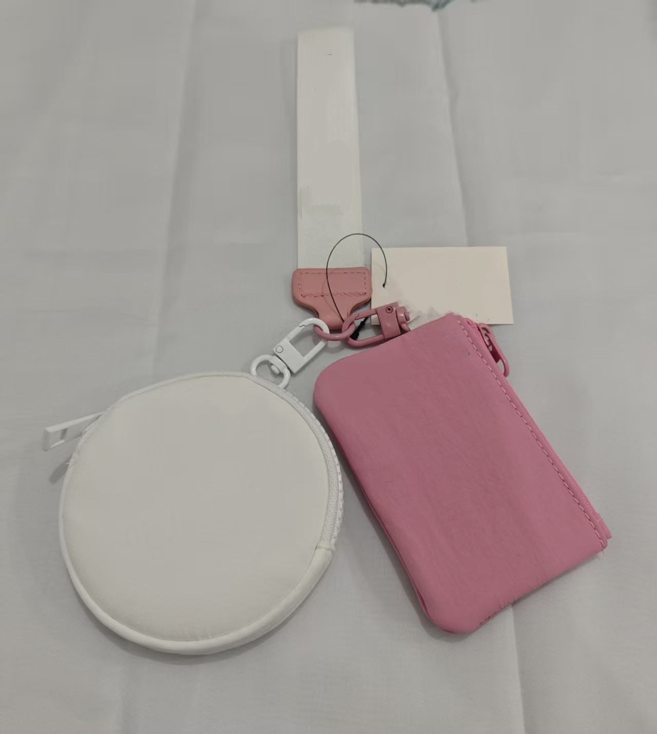 L5236#  Double-Pocket Wrist Bag