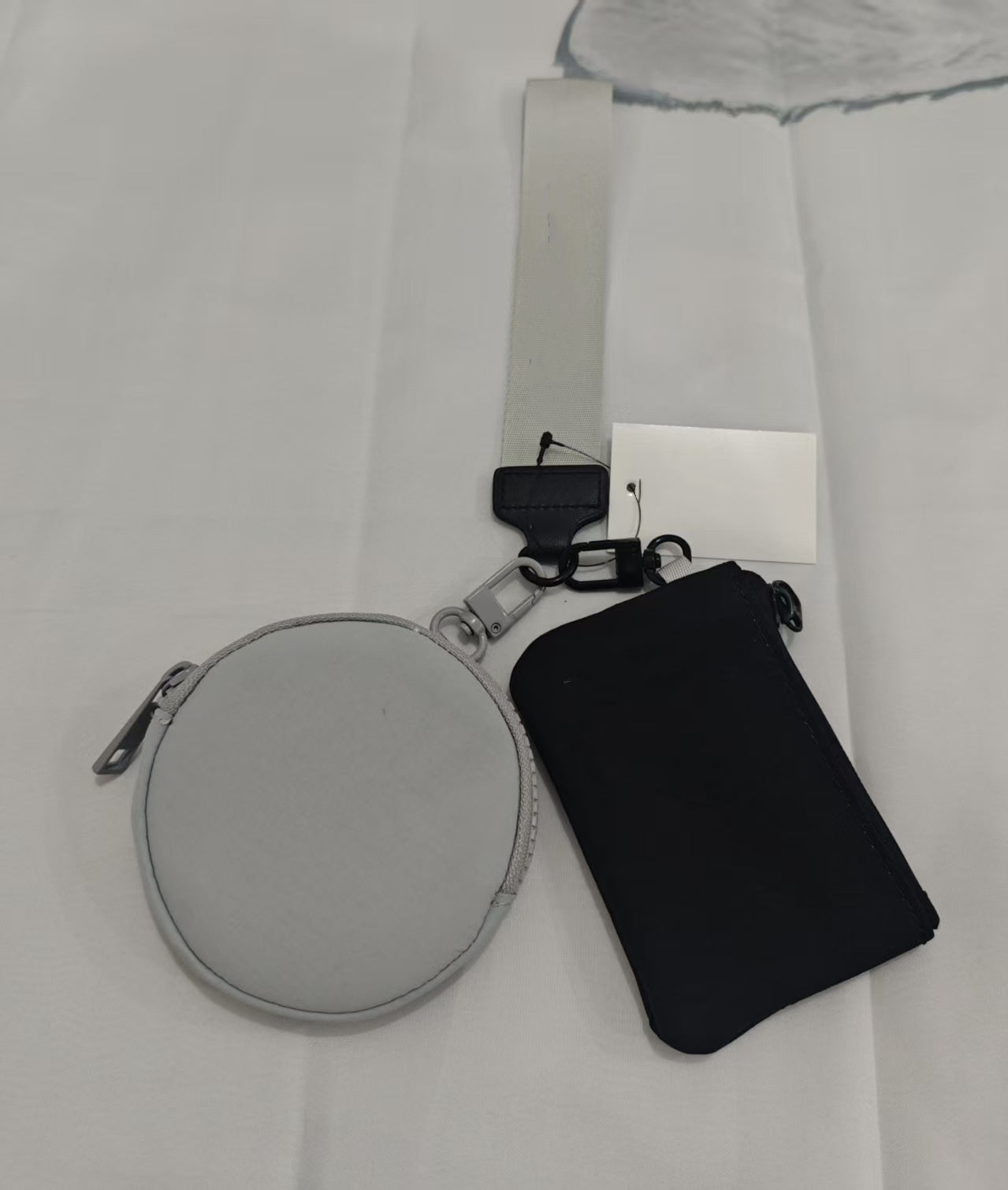 L5236#  Double-Pocket Wrist Bag